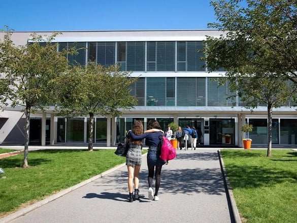 Two Students walking toward the ISL Entrance