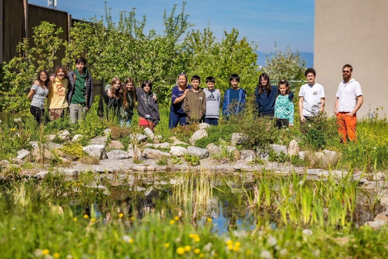 students-around-pond